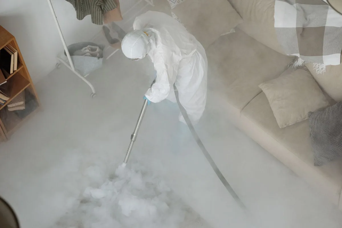 Biohazard cleanup technician in protective equipment, Ottawa Hills, OH